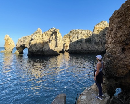 Cliff formations next to open sea in Algarve
